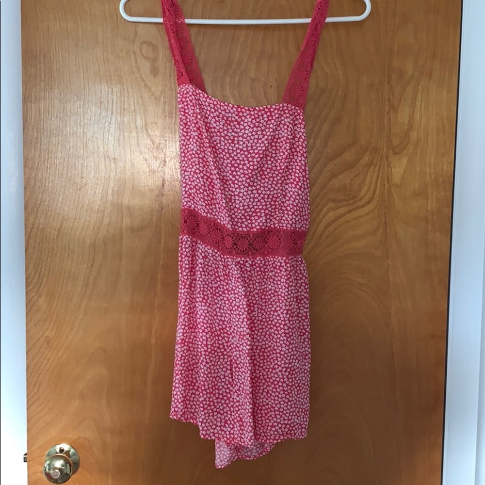 Pink floral holister romper with open back